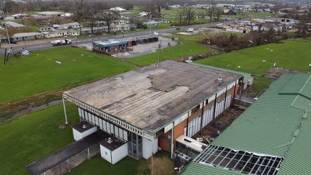 Aerial view of storm-damaged buildings