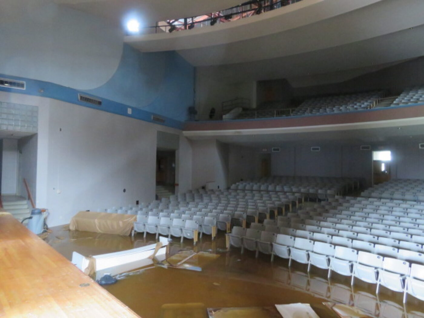 Water damage inside a school auditorium